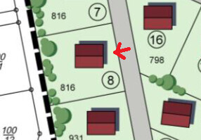 Site plan of a building plot with parcels, houses and trees
