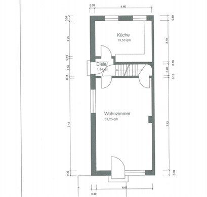 2D floor plan of a small house with entrance hall, kitchen, and living room