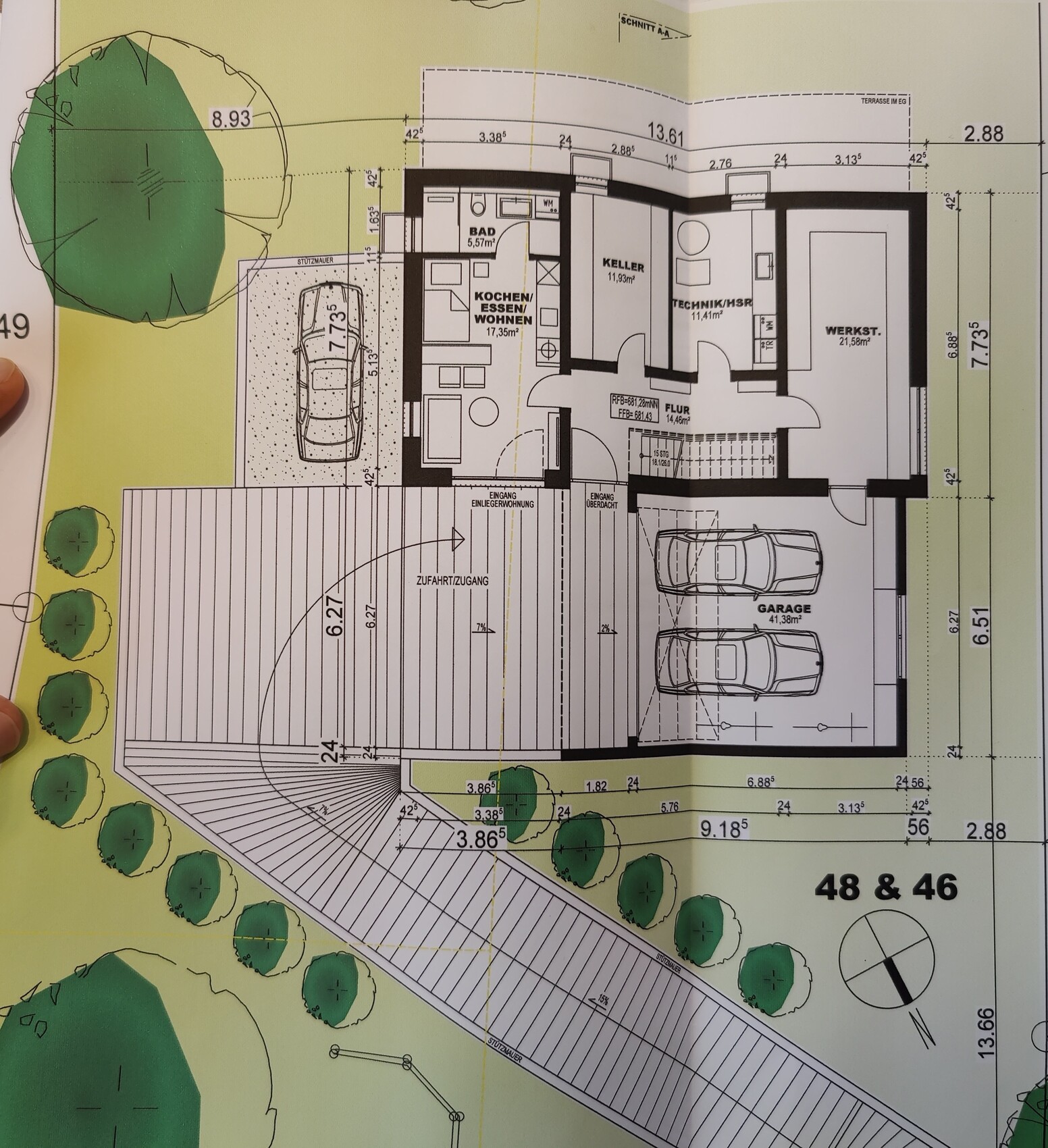 Floor plan of a house: garage, workshop, kitchen/living area, bathroom, basement, hallway.