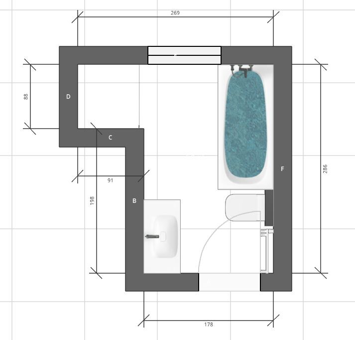 Top view of bathroom floor plan with sink, toilet and bathtub.