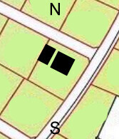 Site plan of a plot with two black rectangular building areas next to streets