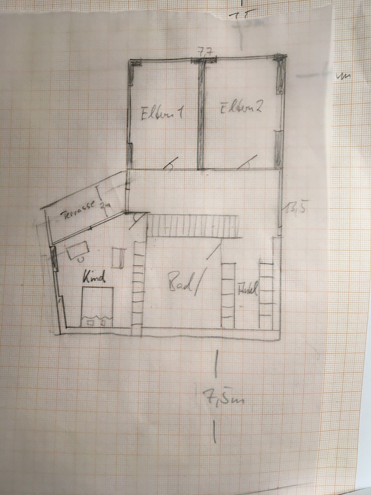 House floorplan: Upstairs two master bedrooms; downstairs child’s room; middle bathroom; right hallway; terrace left.
