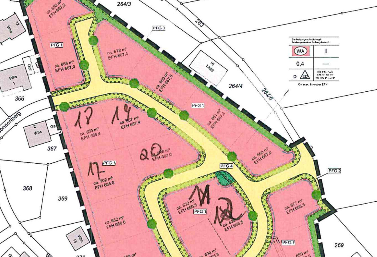 Site plan of a building area with pink plots, yellow street lines and green spaces with trees
