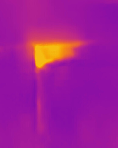 Thermal image of a wall opening with clearly visible heat loss.