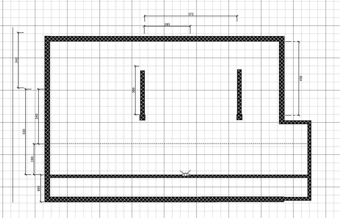 Technical floor plan of a rectangular room with surrounding wall and two interior supports