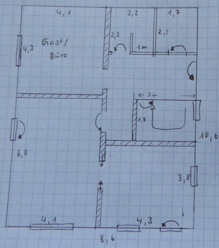 Hand-drawn floor plan sketch of a house with guest and office areas, doors, and walls.