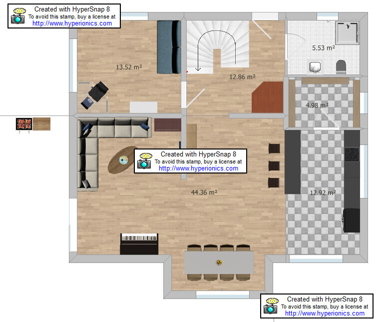 Floor plan of a living area with open kitchen, dining area, stairs, and bathroom.