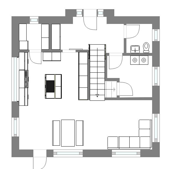 Grundrissplan eines Hauses mit Wohnzimmer, Küche, Treppenhaus und Badezimmer