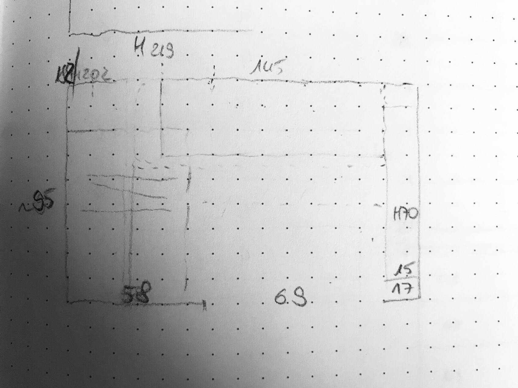 Sketch of a rectangular floor plan with internal layout and dimensions.