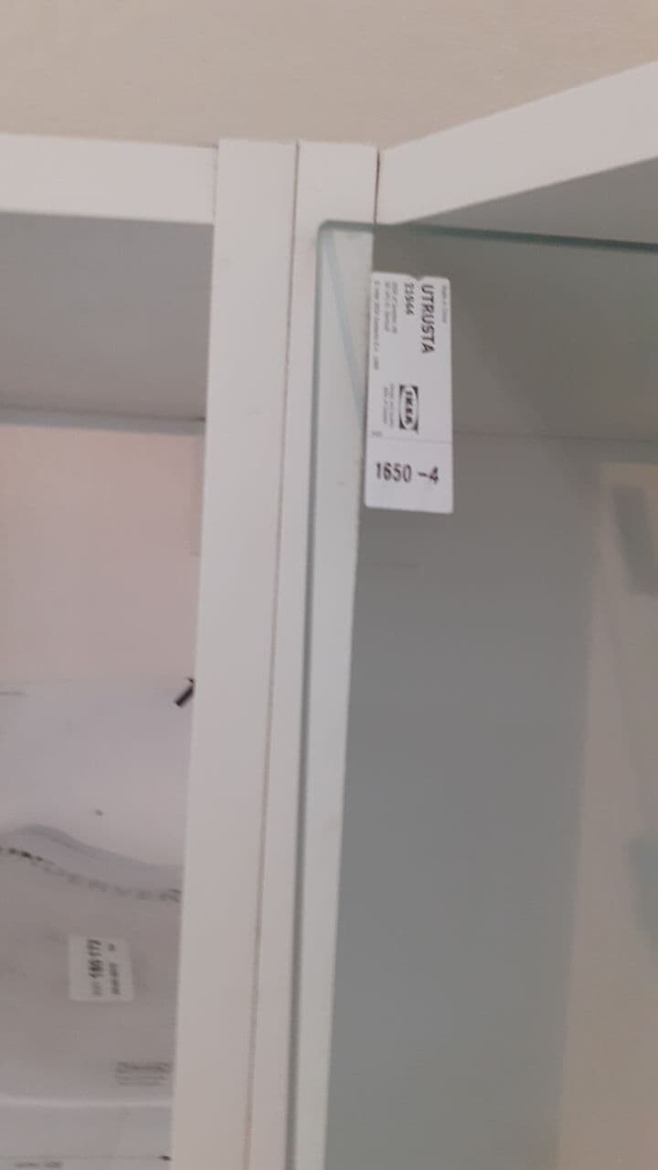 White glass door with label on the glass; number 1650-4 visible.