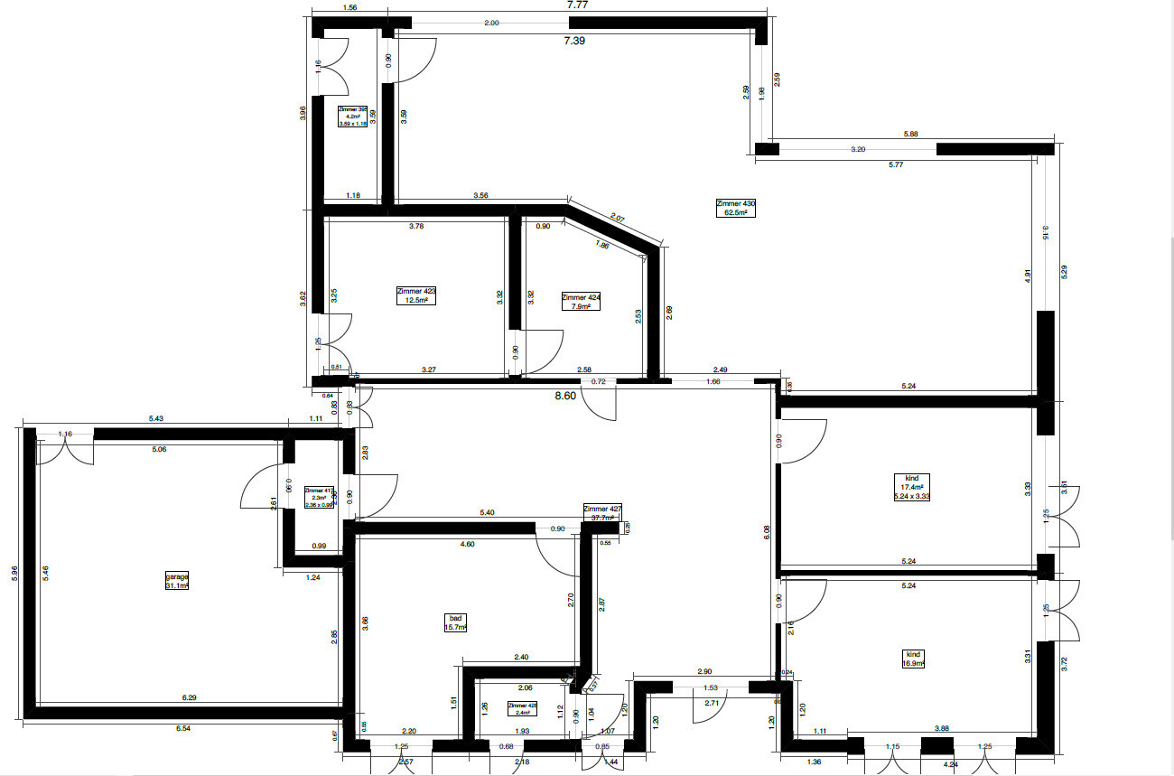 Floor plan of a building: several rooms, doors and dimension markings visible.