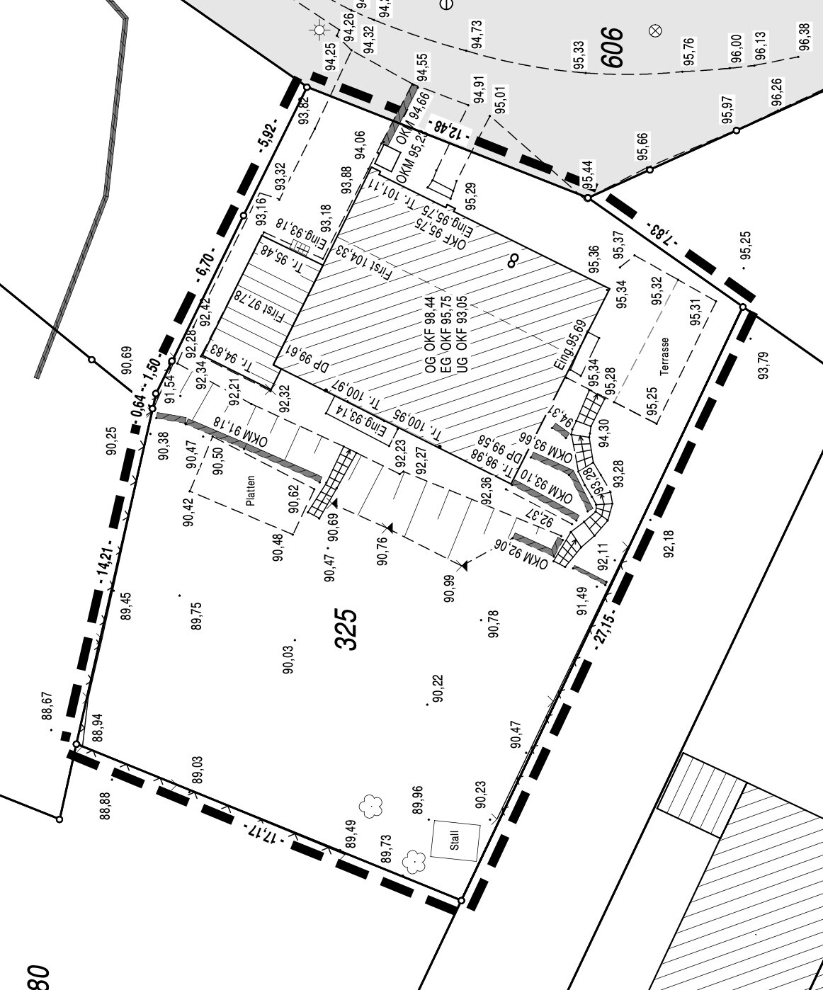 Site plan of a building plot: buildings, access roads, parking spaces, and site boundaries.