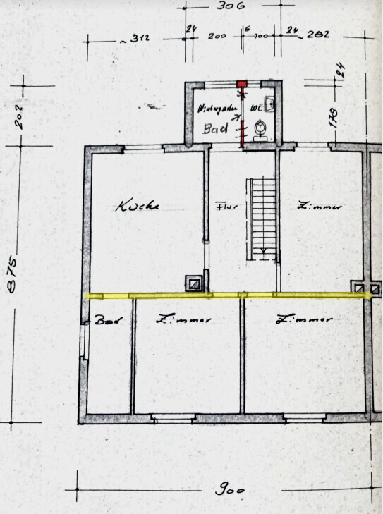 Floor plan of a house with kitchen, bathroom, three rooms and staircase