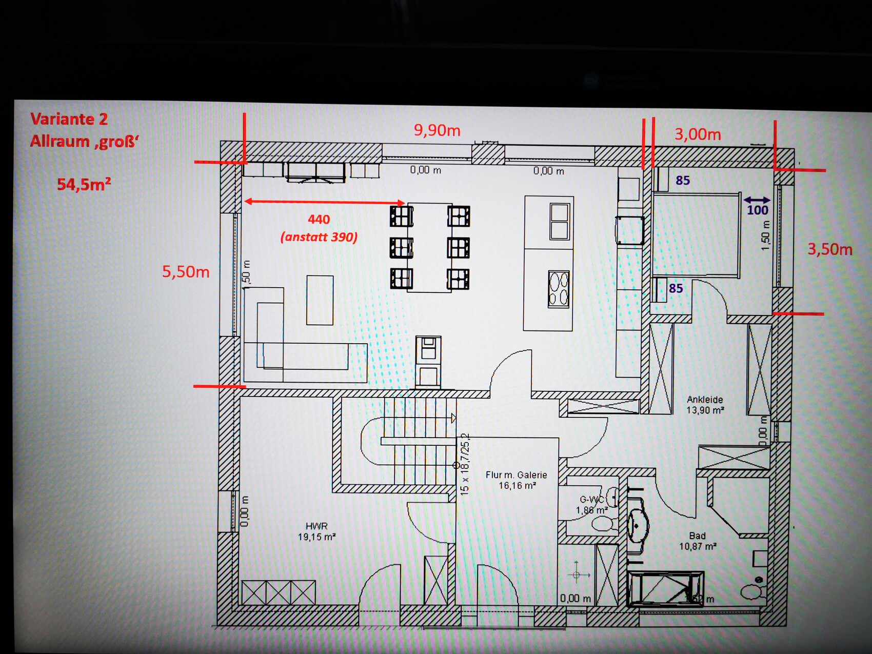 Floor plan of an apartment: open living area with dining table, kitchen, sofa; bathroom, bedroom, utility room.