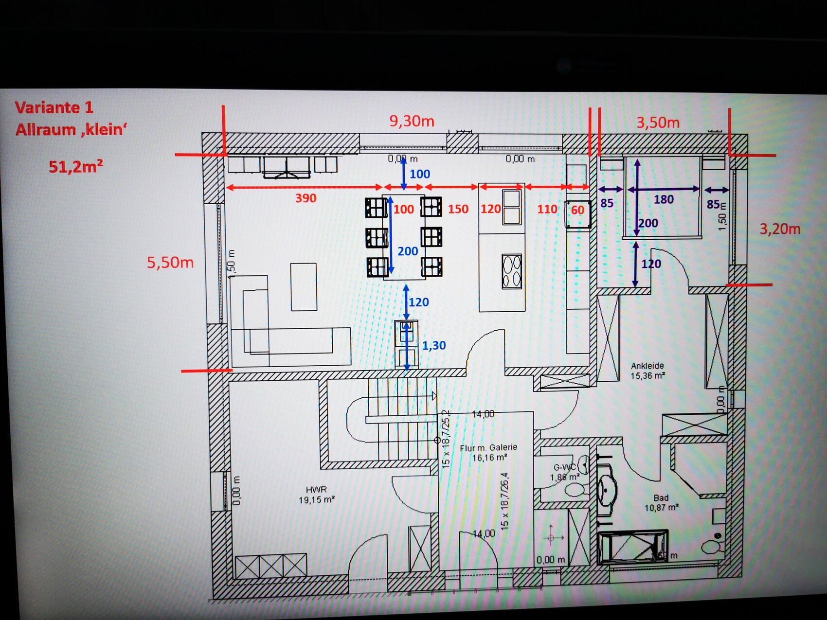 Floor plan of a small living space with open kitchen, dining table, sofa and bathroom.