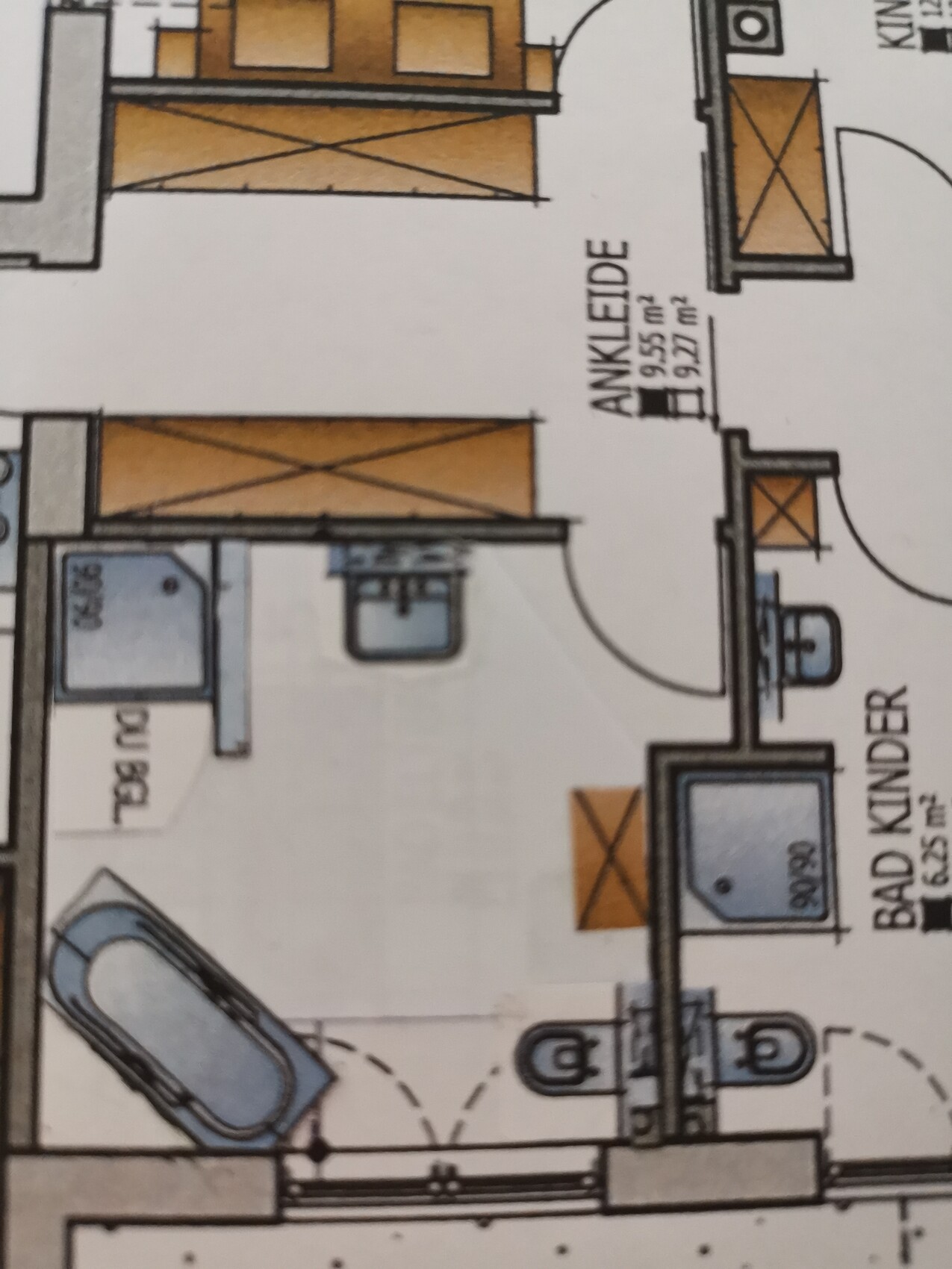Plan of a bathroom floor plan with bathtub, sink, and toilet.