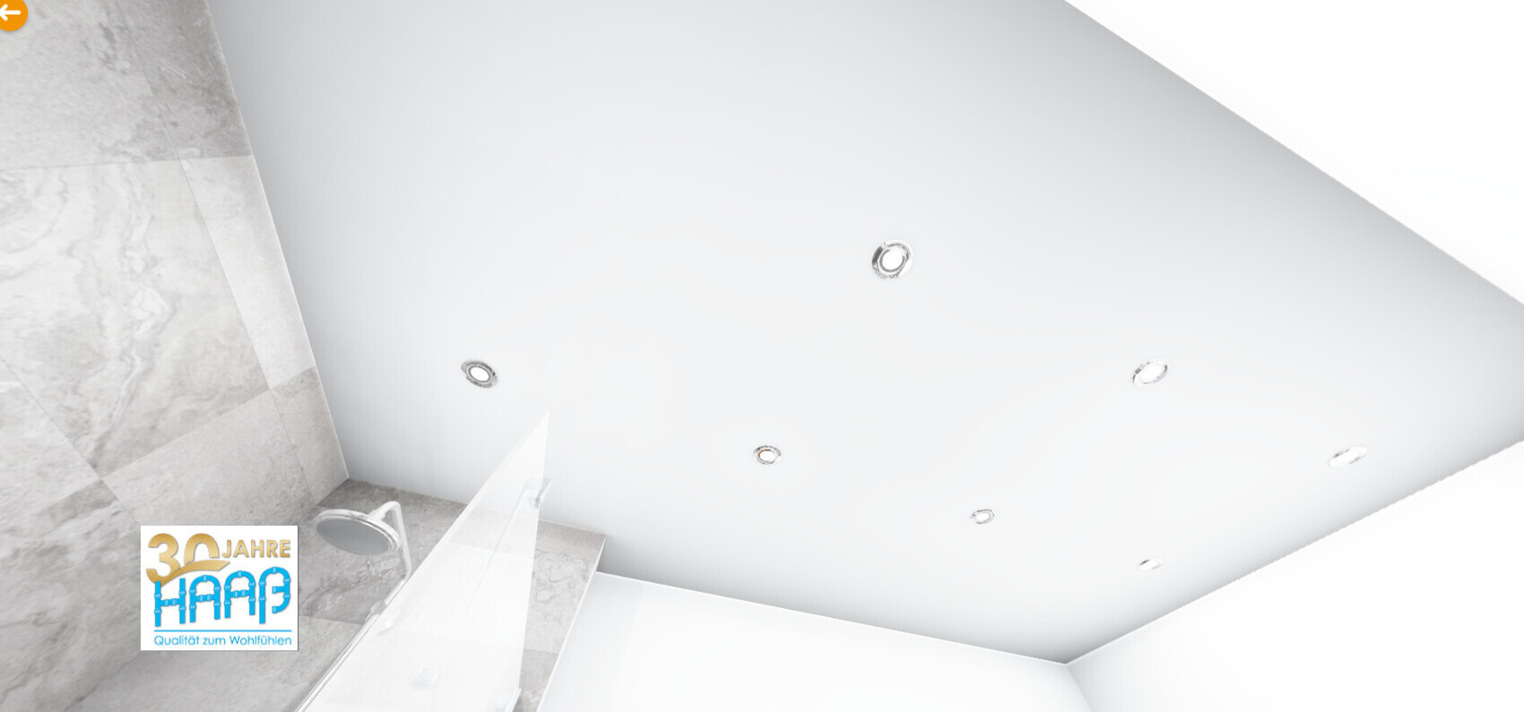 Modern bathroom: white ceiling with spotlights, marble wallpaper on the left, glass shower; logo bottom left.