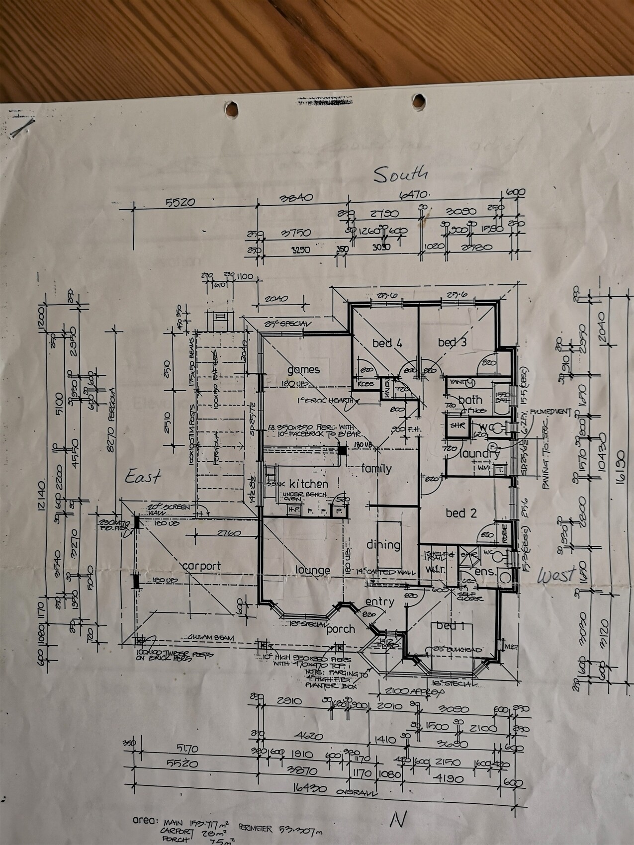 Detailed floor plan of a residential house with kitchen, living room, bedroom, and bathroom.