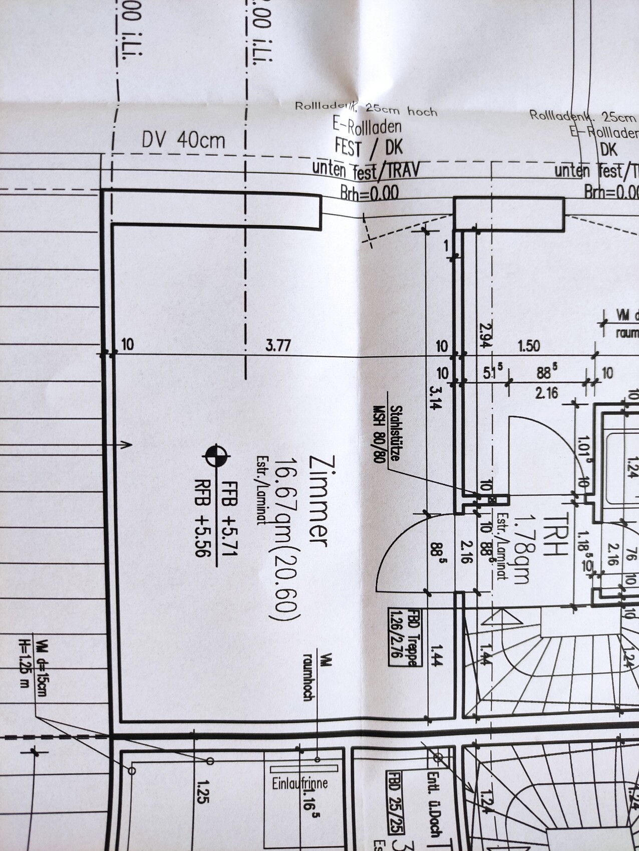 Architectural floor plan of a house with rooms, hallway, and stairs.