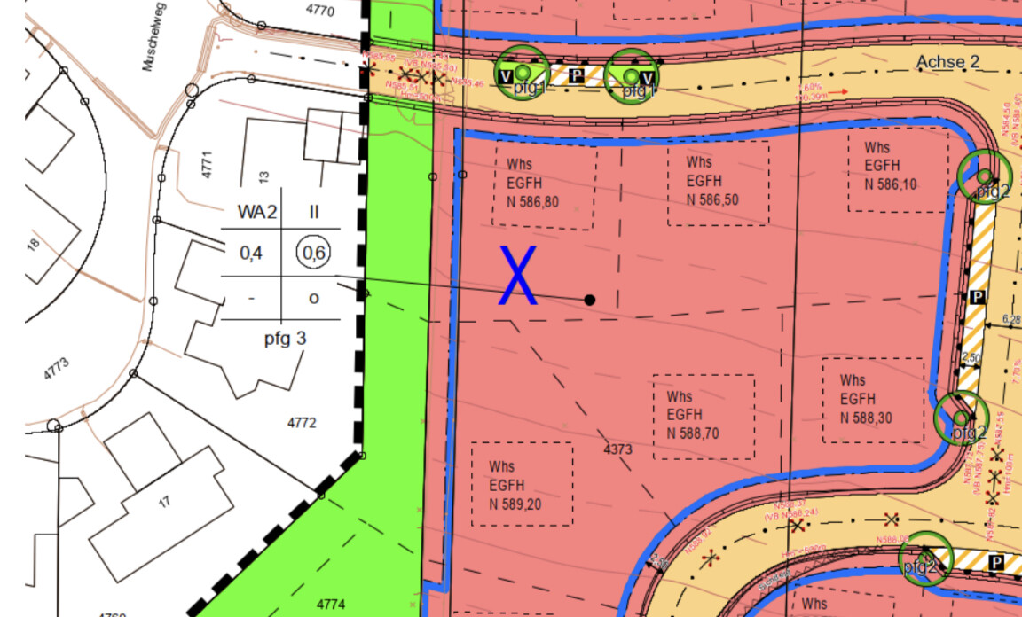 Site plan of a building area with colored parcels, streets and boundary lines.