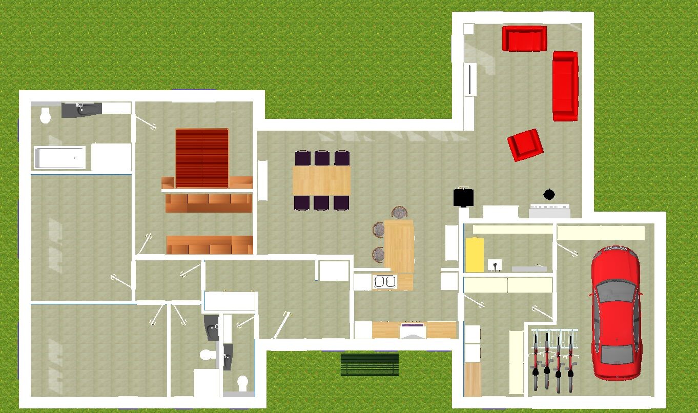 Von oben gezeigter Hausgrundriss: Küche, Wohnzimmer, Schlafzimmer, Bad, Garage mit rotem Auto.