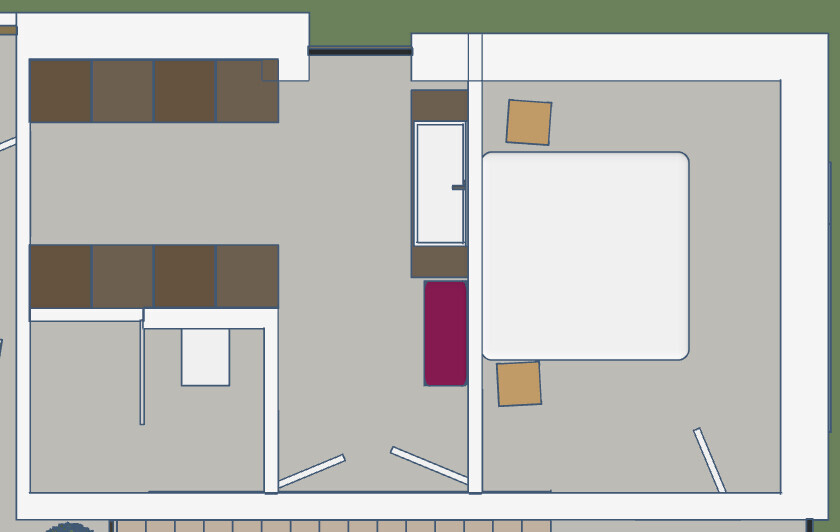 Floor plan of an apartment: living room on the left; central hallway; bedroom with bed on the right.