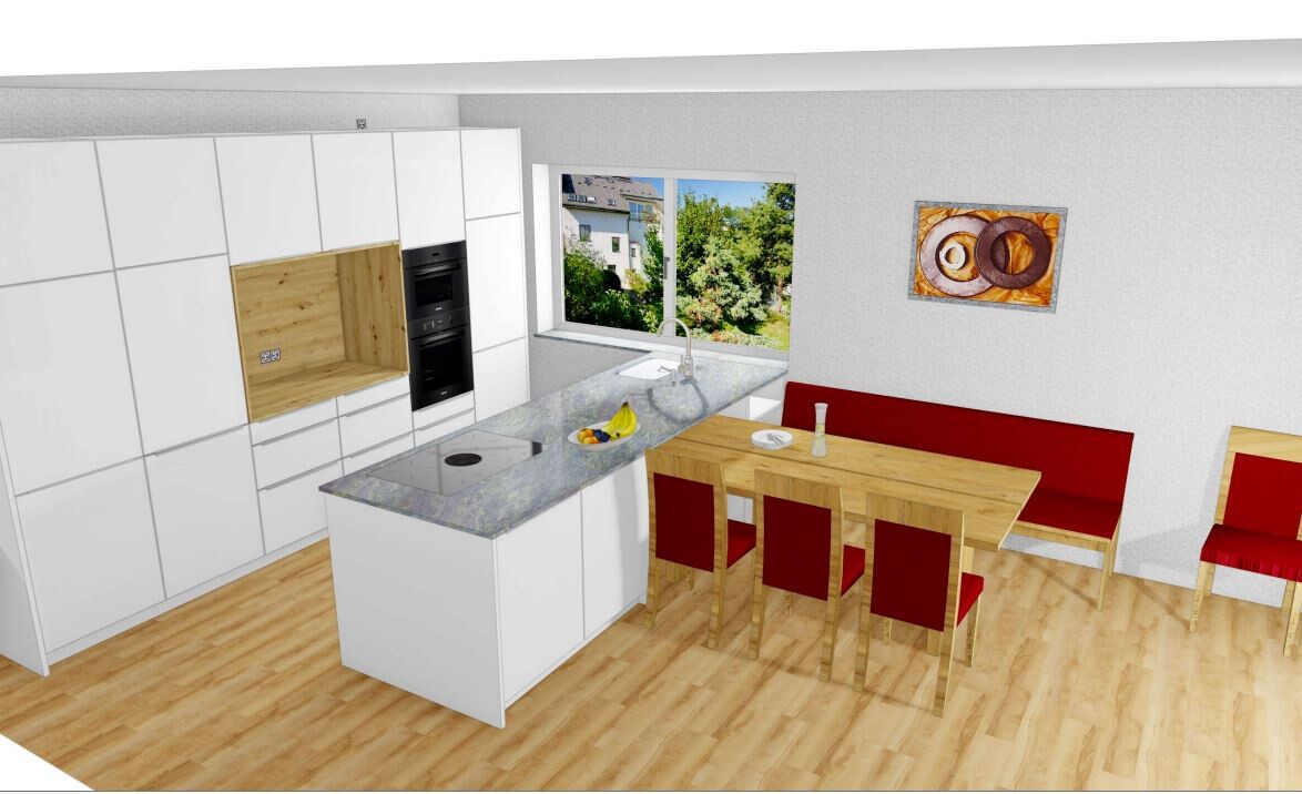 Kitchen with white fitted kitchen, island, and dining table with red chairs, window view.