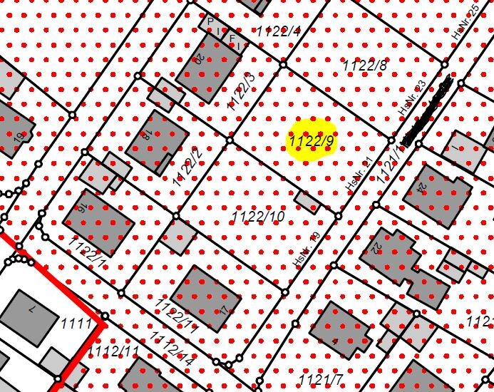 Site plan of the plots with buildings; red dots over area, yellow circle marks 1122/9