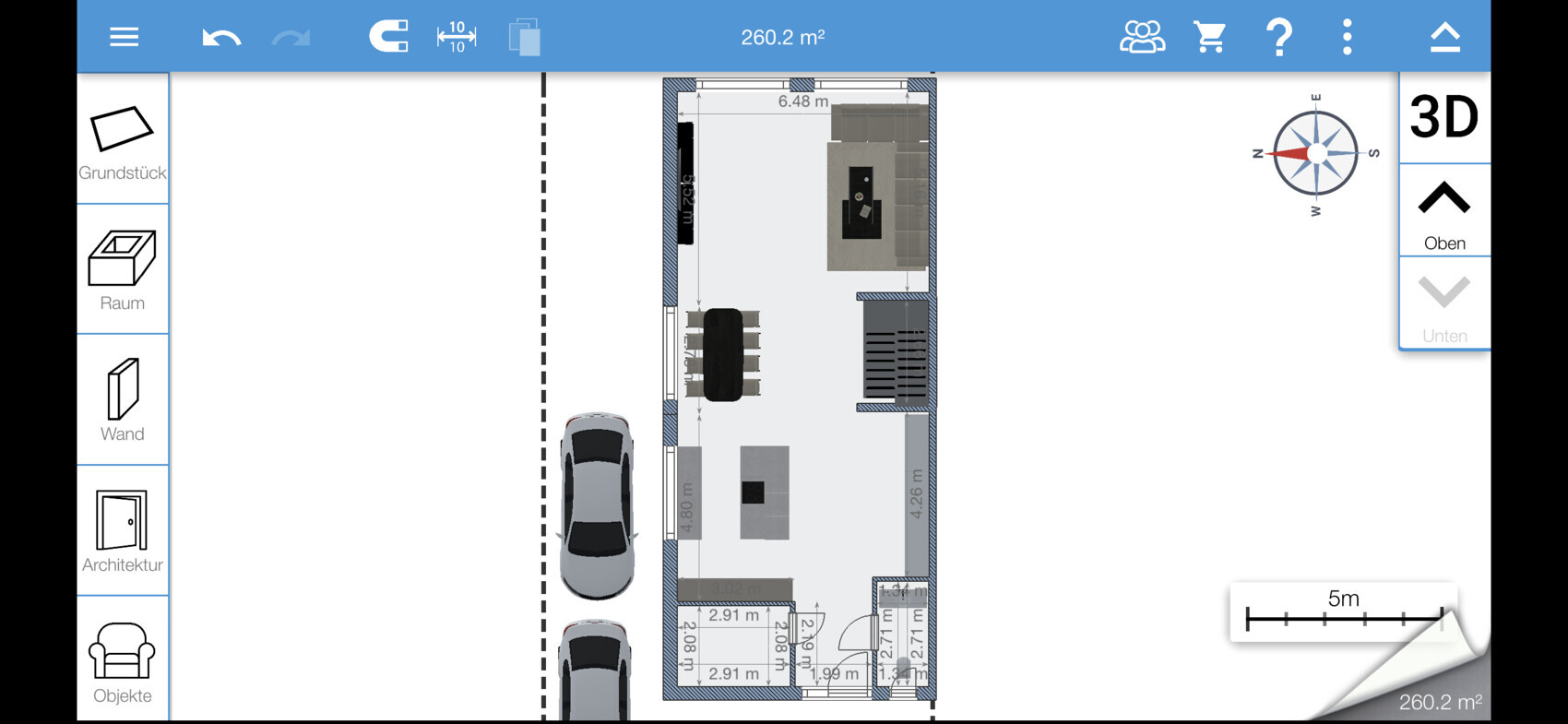Floor plan of a house with kitchen, dining table, sofa, stairs and parking spaces.