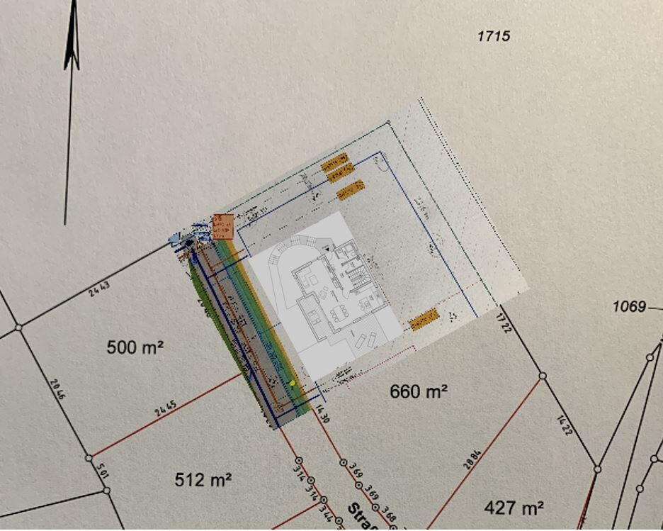 Site plan of a building plot with property boundaries, area specifications, and building structure