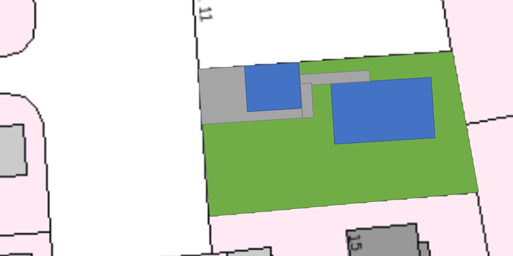Site plan: green area with blue building structure, gray extensions; surrounding plots.