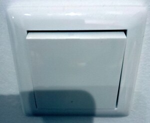 White plastic wall switch – close-up