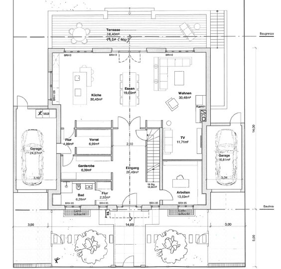 Floor plan of a house with kitchen, living room, dining area, bathroom, terrace and garages