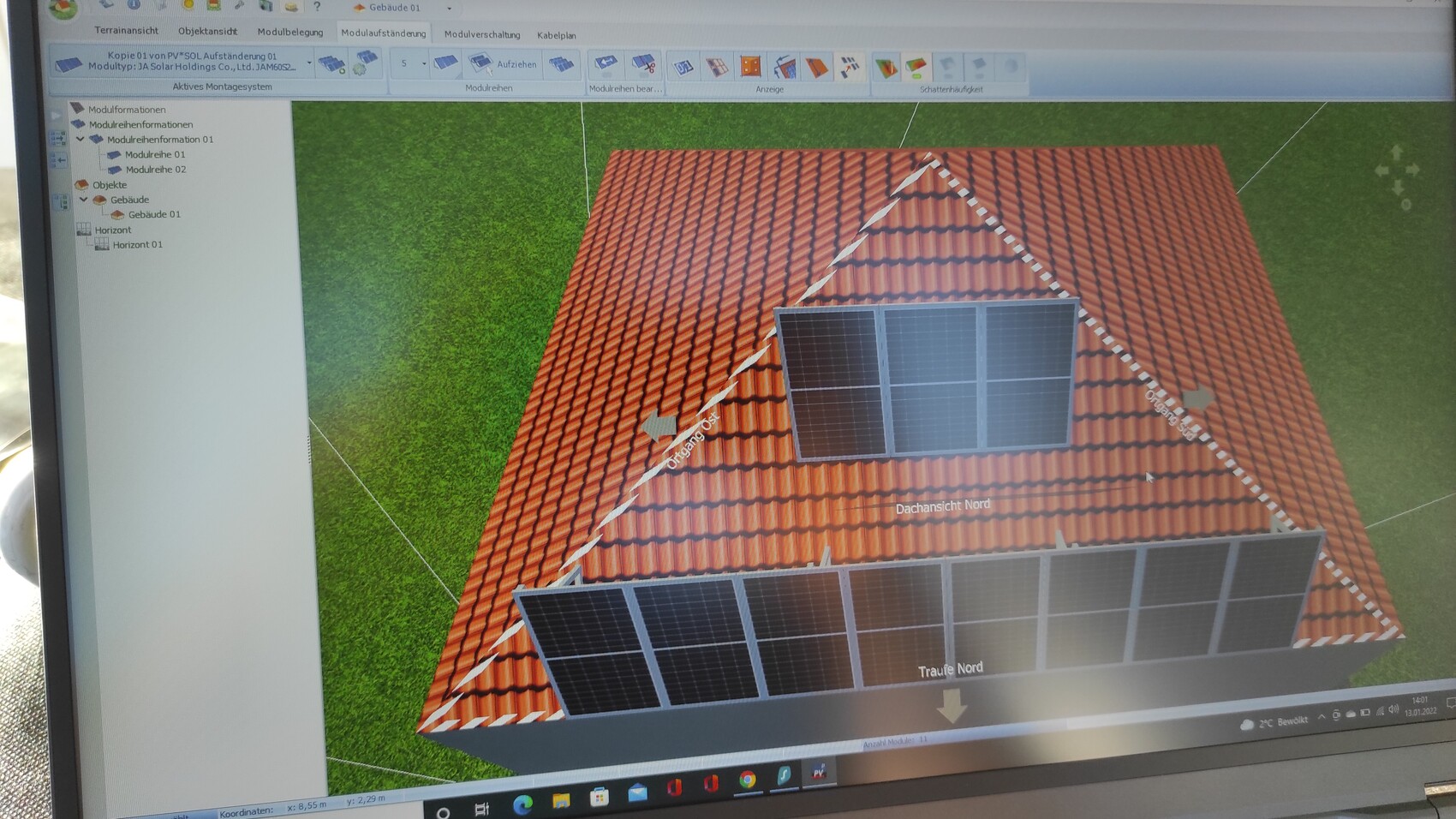 Bird’s-eye view: red tiled roof with solar panels, CAD view.