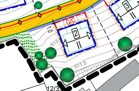 Site plan of a building lot with road, trees, and building structures