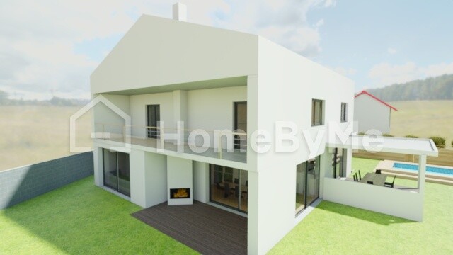 Modern white villa with large glass fronts, terrace and garden, pool on the right in the background.
