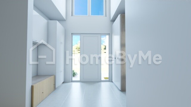 Bright modern entrance area with glass front, tall windows and narrow bench on the left.