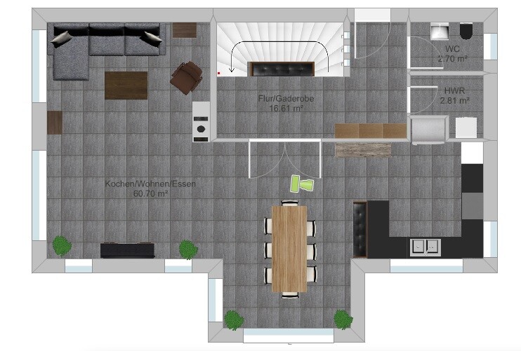 Open plan kitchen/living/dining area with dining table, sofa, kitchen island, stairs, WC, utility room.