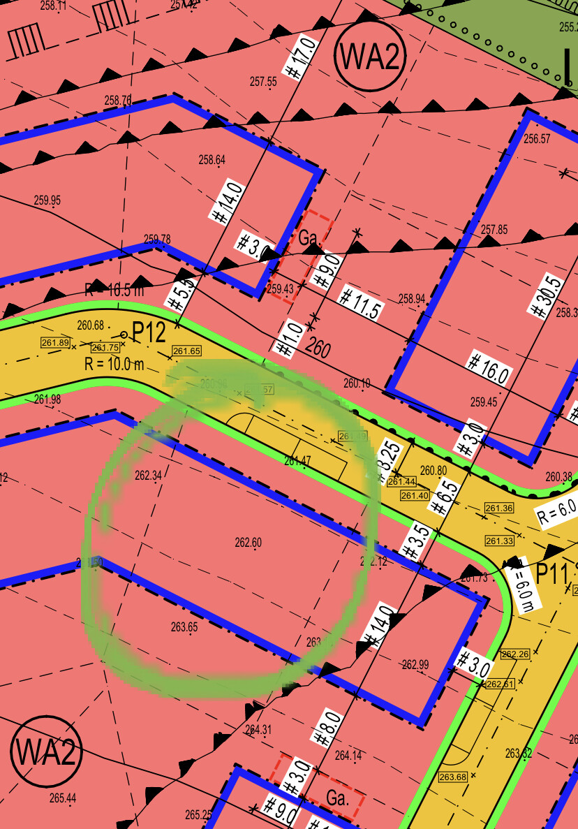 City plan section with pink building areas, blue outlines, yellow streets, green paths.
