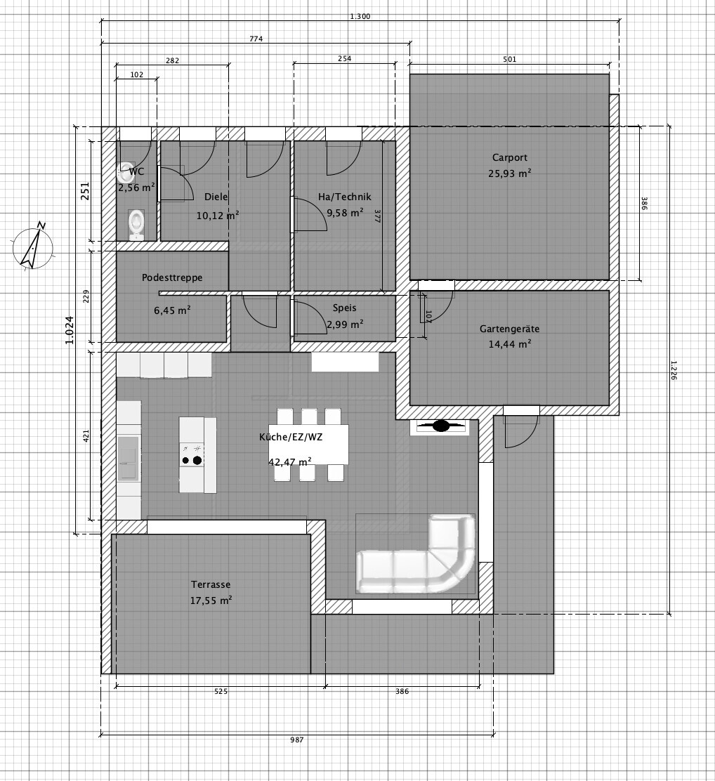 Floor plan of a house with kitchen, living room, terrace, and carport