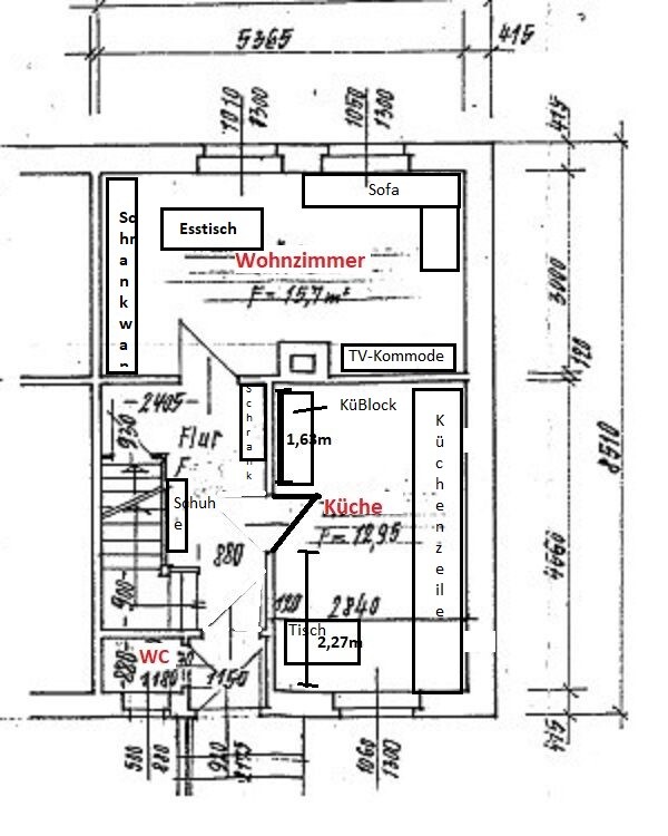 Floor plan of a living room with sofa, dining table, TV cabinet, and kitchen island.