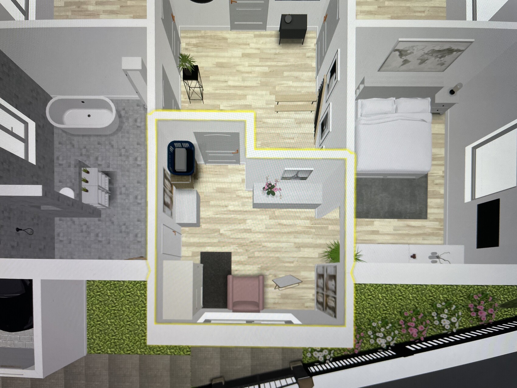Top view floor plan of an apartment with yellow border, bedroom, bathroom, kitchen, living room.