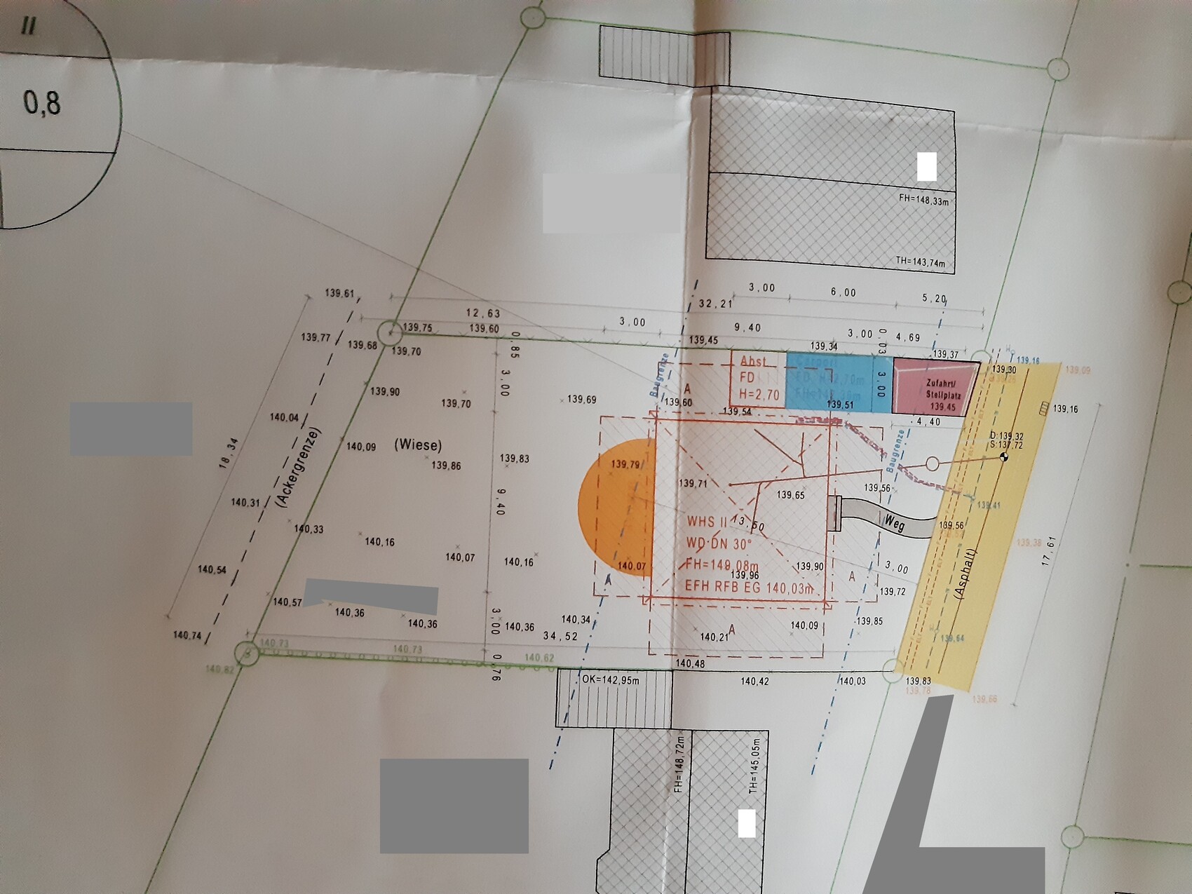 Site plan of a building plot with building areas, measurements, access roads, and important zones.