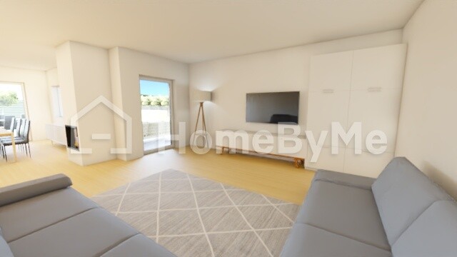 Bright living space with gray sofas, TV wall, white cabinet, rug and window