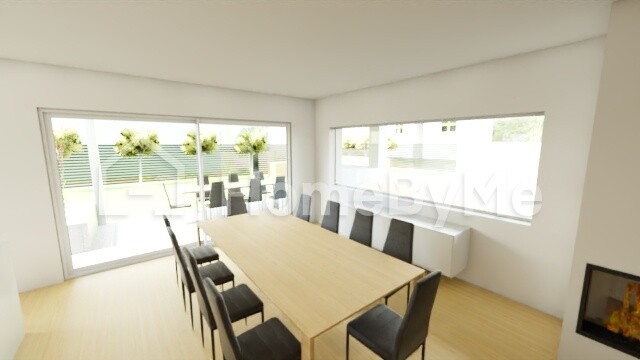 Bright dining room with long wooden table and black chairs; large window front to the terrace.