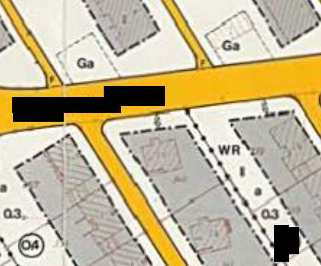 Kartenabschnitt eines Bebauungsplans mit gelben Straßen und rechteckigen Parzellen