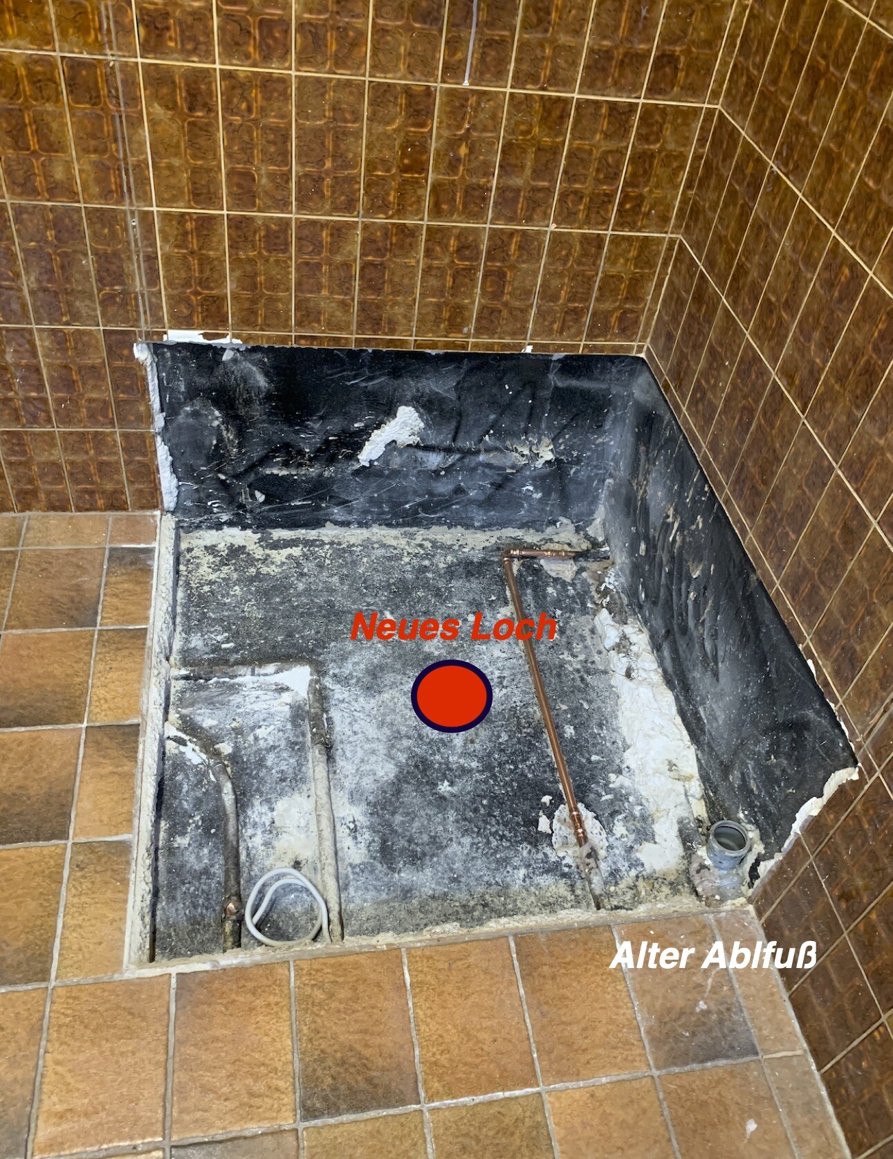 Bathroom floor with excavated area; red marked hole 'New Hole' next to old drain.