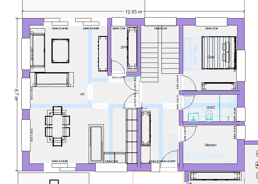 Floor plan: open living and dining area on the left, stairs in the middle, guest and media rooms on the right, WC.