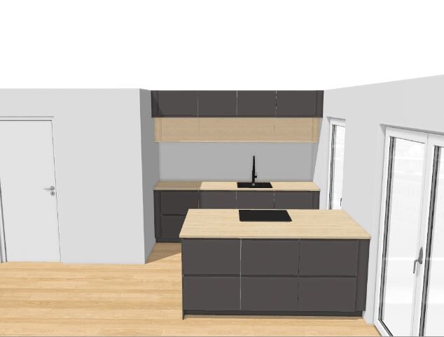 Modern kitchen with grey base cabinets, wooden countertops, sink, and island with cooktop