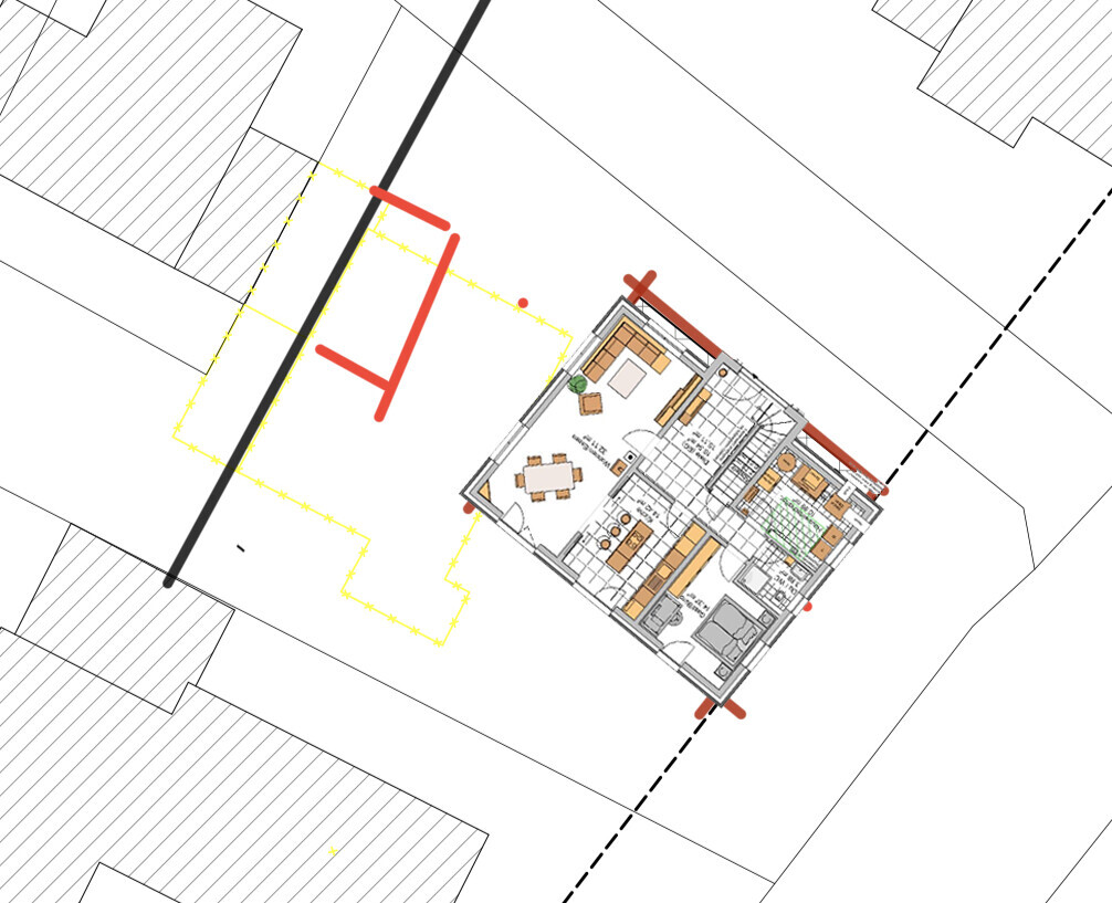 Top-down floor plan of a house with interior layout and yellow outline lines
